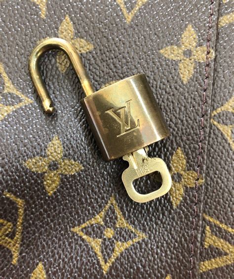 louis vuitton lock charm|Louis Vuitton keychain price.